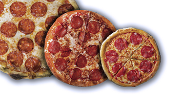 An aerial view of three pizzas of different sizes and shapes. 