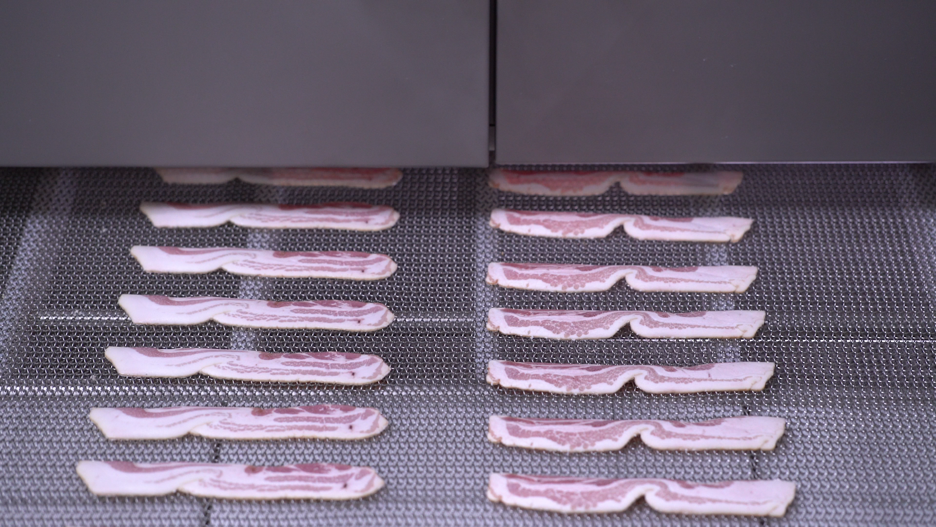 Bacon strips on Grote high speed slicer