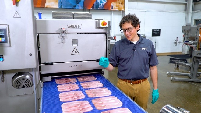 Grote rep demos a Slicer/Applicator with country ham. 